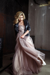 Beautiful blonde young bride woman in color wedding dress. rock style, fashion beauty photo