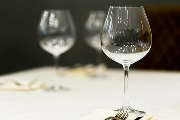 glasses on the table serving restaurant light background