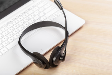 headset on keyboard computer laptop