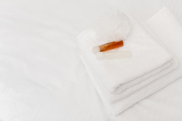 Clean towels on bed at hotel room