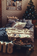 Christmas interior bedroom. Cozy and stylish modern room