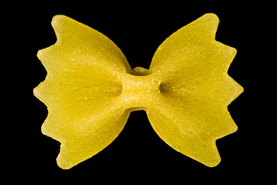 Farfalle pasta isolated on black