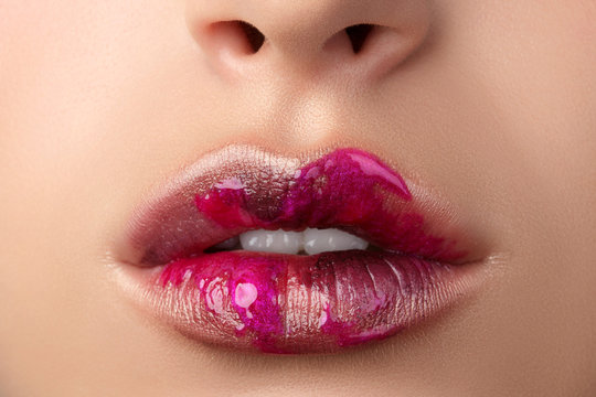 Close up view of beautiful woman lips with modern fashion make up