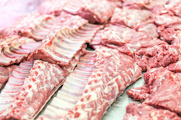 Fresh and raw beef meat chops in a market or shop