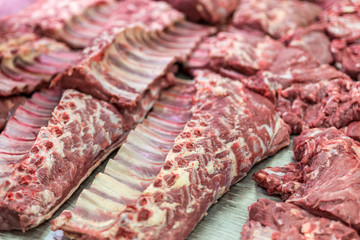 Fresh and raw beef meat chops in a market or shop