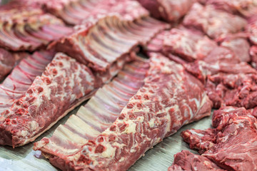 Fresh and raw beef meat chops in a market or shop