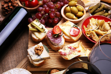 Italian antipasti wine snacks variety set. Cheese, Mediterranean olives, pickles, Prosciutto di...