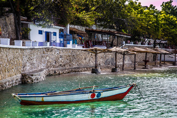 Fototapeta na wymiar Haitian taxi tied up by the shore