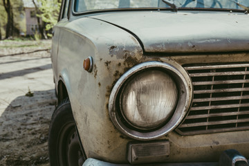 Fototapeta premium Headlight retro classic car close up
