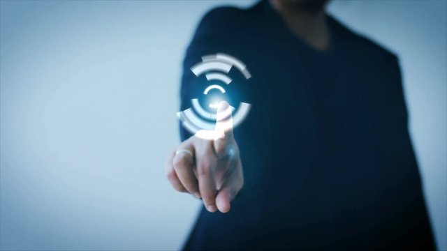 4K Business woman pointing finger on HUD And graph bar pi for Cyber futuristic concept technology element on the dark background
