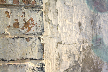 very old a battered and worn brick wall