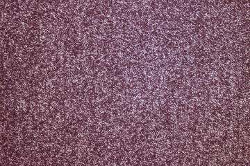 Purple rippled background.