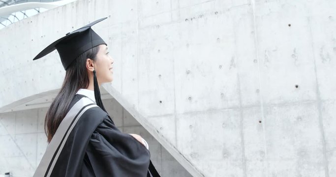 Woman think of the future after graduation
