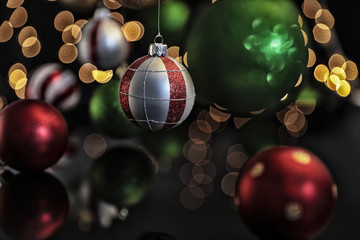 Obraz premium Christmas ornaments on defocused lights