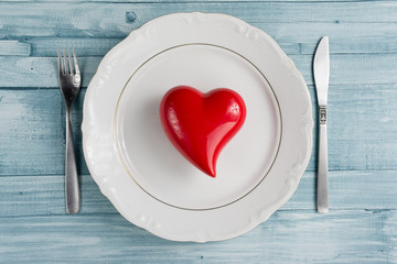 Setting for valentine's day romantic dinner. Top view. Space for text. Black background