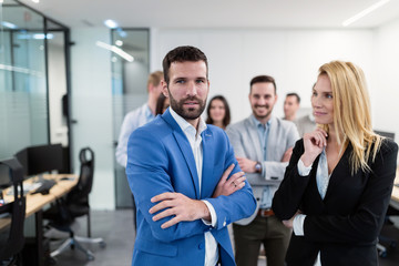 Group picture of business team posing in office