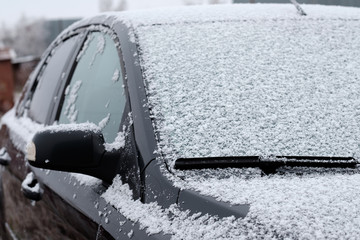 Winter frozen car window