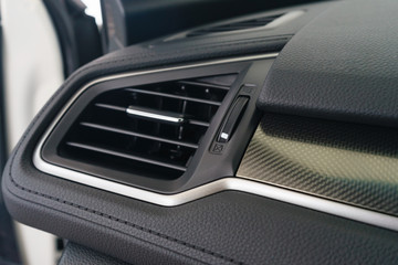 Interior of a modern car, Car Air Conditioner and switch on/off compartment.