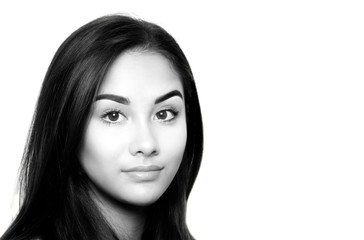 Black and white portrait of beautiful young woman face isolated in white background