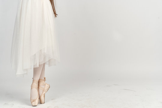 ballerina feet on a white background