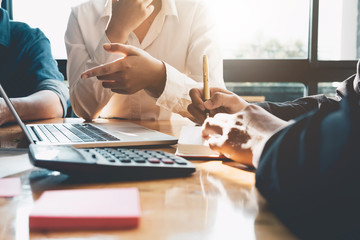 Business people are meeting for analysis data figures to plan business strategies. Business discussing concept