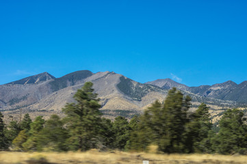 View of the San Francisco Peaks while leaving Flagstaff Arizona