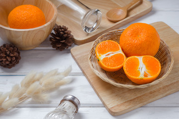 Collection of ripe orange on wooden table