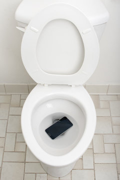 Smartphone Dropped Into Toilet