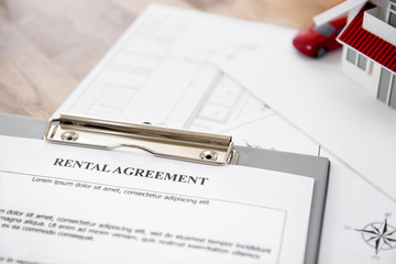 Fototapeta premium Rental agreement contract paper on the table