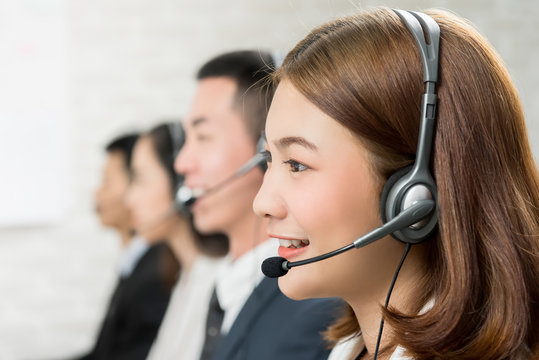 Asian woman telemarketing customer service agent team