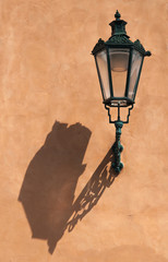 Old street lamp on the wall