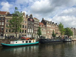 View of boats and apartments in an Amsterdam canal
