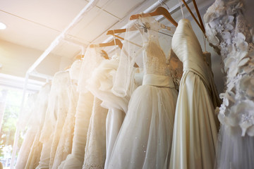 Beautiful bridal dress on hangers