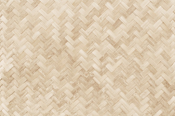 Fototapeta Old bamboo weaving pattern, woven rattan mat texture for background and design art work. obraz