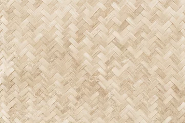 Fototapeten Old bamboo weaving pattern, woven rattan mat texture for background and design art work. © Nattha99