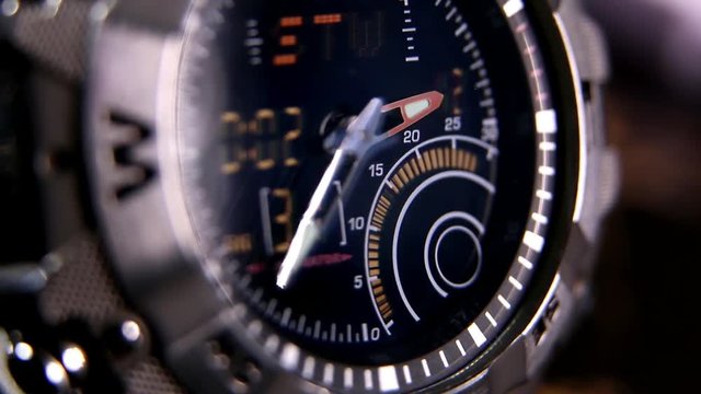 Macro close up of a tactical digital watch face functioning
