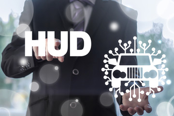 Head-up display smart car concept. Head Up Display Information Modern  Auto Technology. Digital Automobile Assistant. Man using virtual interface offers car microchip circuit icon and presses HUD.