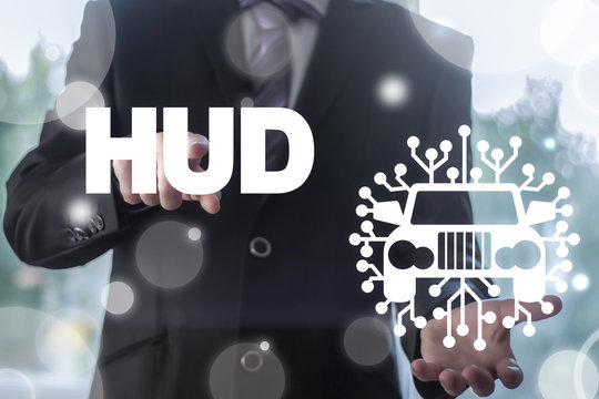 Head-up display smart car concept. Head Up Display Information Modern  Auto Technology. Digital Automobile Assistant. Man using virtual interface offers car microchip circuit icon and presses HUD.