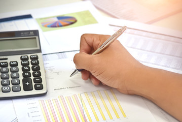 Review accounting data and calculate production income.