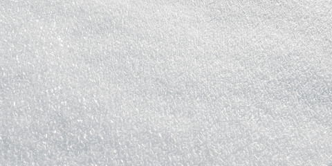 Snow Covered - medium close-up of a snowy ground on a bright winter day