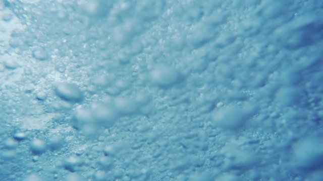 Air bubbles underwater as abstract background