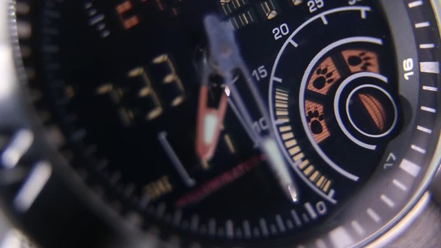 Macro close up of a tactical digital watch face functioning

