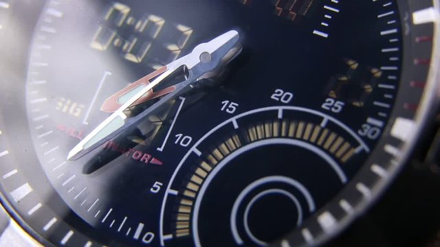 Macro close up of a tactical digital watch face functioning
