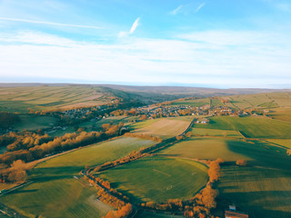drone aerial view of water and trees countryside