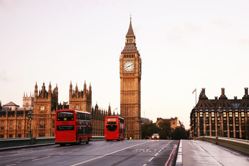 Obraz na płótnie Canvas Scene of Westminster Bridge seen from South Bank, quiet morning double decker bus present. 