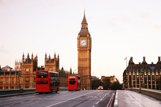 Fototapeta Scene of Westminster Bridge seen from South Bank, quiet morning double decker bus present.   