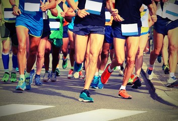 women and men runners with sneakers