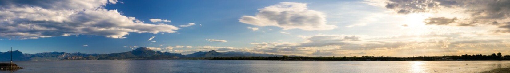 Fototapeta na wymiar Very large horizontal panorama on Garda Lake