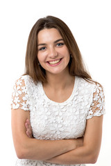 Young beautiful woman standing on white background. Smiling female face.