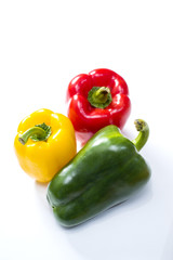 three bell peppers isolated on white background